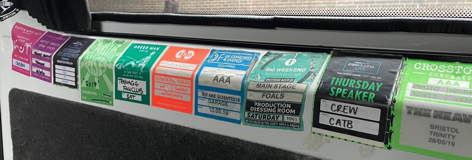 Backstage passes under van window